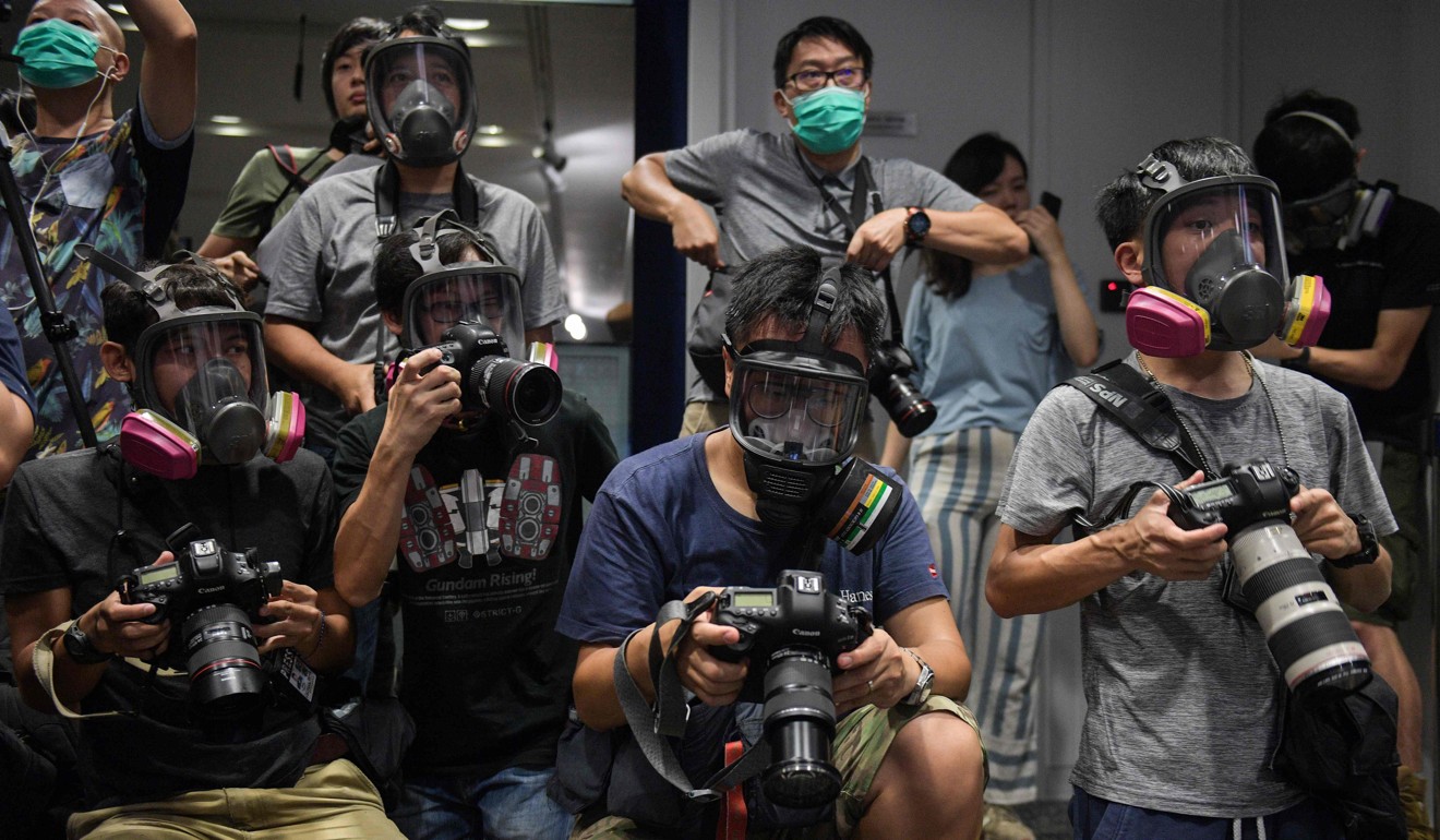根据六月份爆发的反政府抗议活动之前的数据，香港的新闻自由排名从一年的第57位下降到第61位。图片：法新社